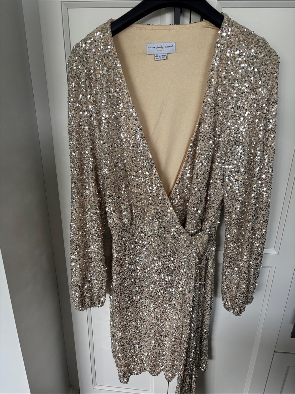 Never Fully Dressed Champagne Sequin Wrap Dress